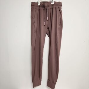 NWOT Halara jogger pants size 12 with pockets muted purple color